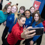 Team Wales Athlete with school children