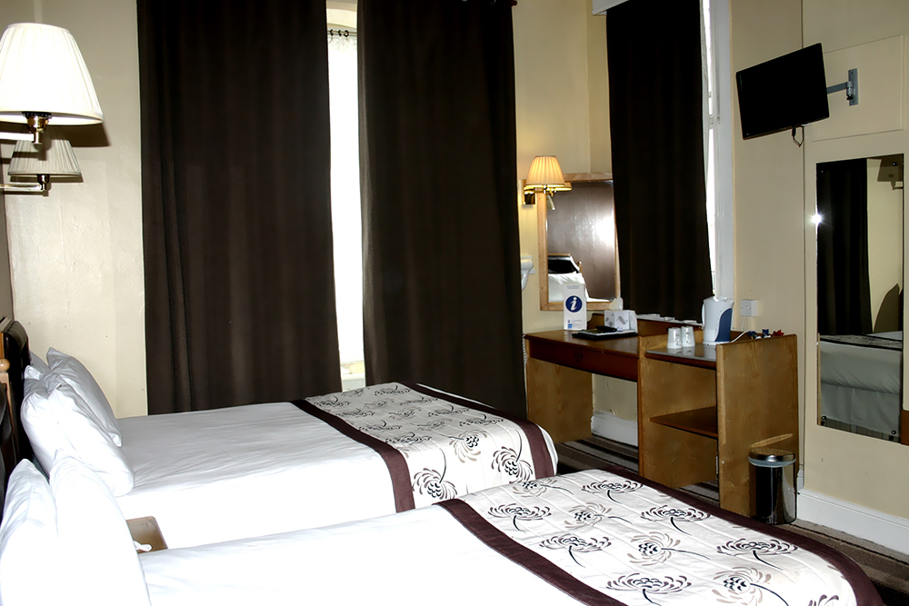 Triple bedroom in the Sandringham hotel