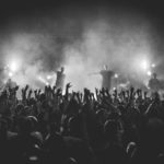 Concert with crowd in black and white
