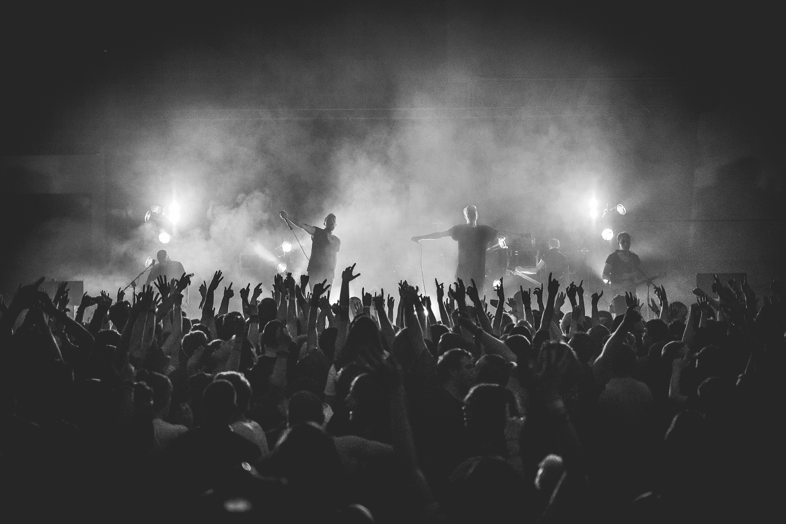 Concert with crowd in black and white