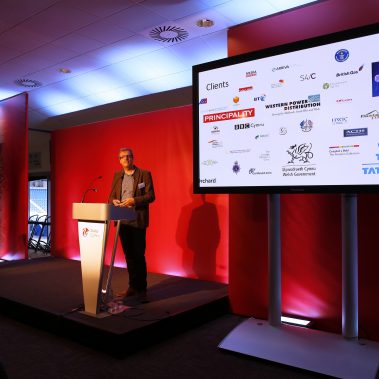 Speaker on stage at press conference